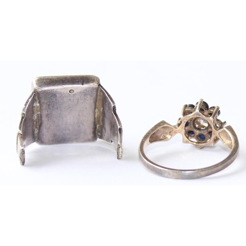 1109 - A retro silver sapphire and white stone floral cluster ring, marked for Birmingham 1959, approx size... 