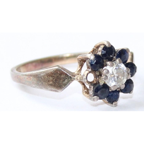 1109 - A retro silver sapphire and white stone floral cluster ring, marked for Birmingham 1959, approx size... 