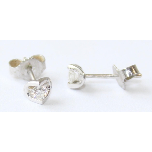 1119 - A pair of 9ct white gold and diamond set stud earrings, marked and XRF confirmed, approx 0.63g gross