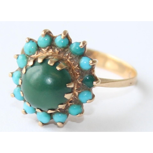 1123 - A 9ct gold turquoise and cabochon green stone set ring, indistinctly marked but XRF confirmed, appro... 