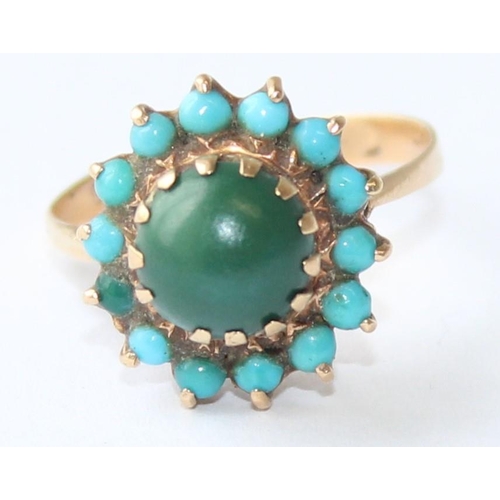 1123 - A 9ct gold turquoise and cabochon green stone set ring, indistinctly marked but XRF confirmed, appro... 