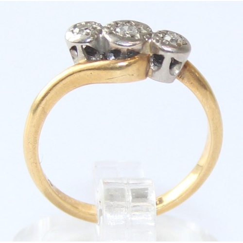 1126 - An 18ct gold diamond trilogy ring with crossover setting, marked 18ct & Plat and XRF confirmed, appr... 