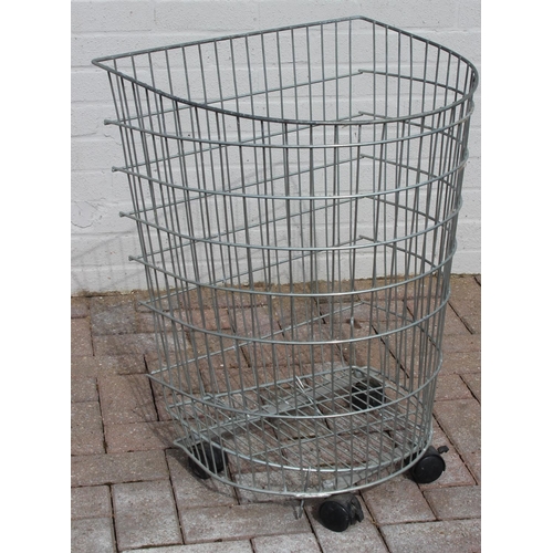 376 - Vintage wirework shelving with advertising for AC Delco and a wirework basket on wheels, shelving ap... 