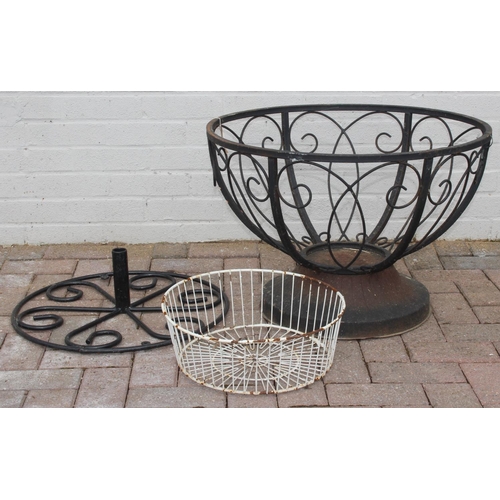 383 - Black painted metal pot holder and a black painted parasol base, pot holder approx 66cm W x 45cm H