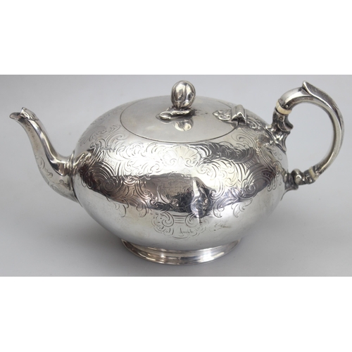 1001 - An early Victorian silver teapot of bulbous form with engraved decoration, armorial and gourd finial... 