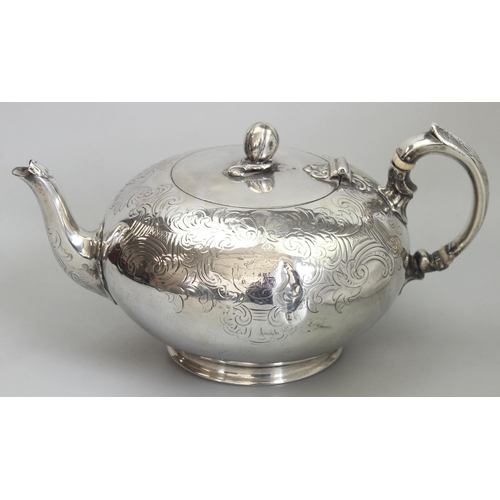 1001 - An early Victorian silver teapot of bulbous form with engraved decoration, armorial and gourd finial... 