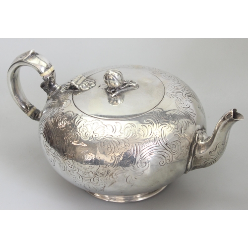 1001 - An early Victorian silver teapot of bulbous form with engraved decoration, armorial and gourd finial... 