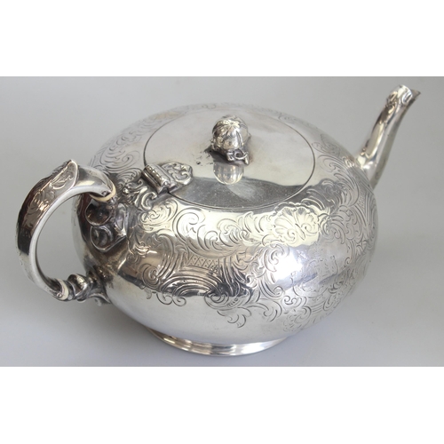 1001 - An early Victorian silver teapot of bulbous form with engraved decoration, armorial and gourd finial... 