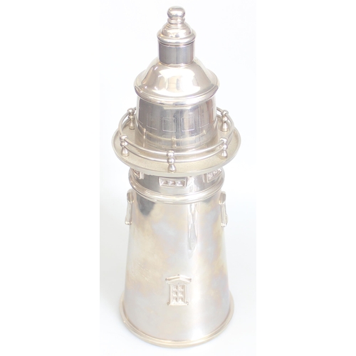 1003 - A large Art Deco style silver plated cocktail shaker formed as a lighthouse, unmarked, approx 36cm t... 