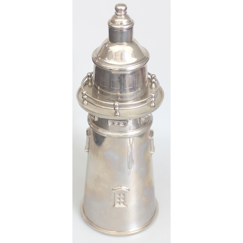 1003 - A large Art Deco style silver plated cocktail shaker formed as a lighthouse, unmarked, approx 36cm t... 