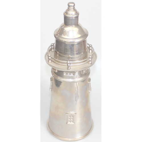 1003 - A large Art Deco style silver plated cocktail shaker formed as a lighthouse, unmarked, approx 36cm t... 