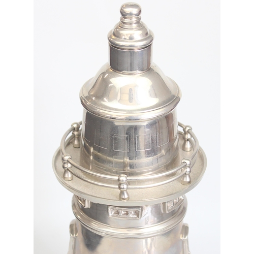 1003 - A large Art Deco style silver plated cocktail shaker formed as a lighthouse, unmarked, approx 36cm t... 