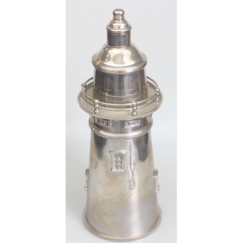 1003 - A large Art Deco style silver plated cocktail shaker formed as a lighthouse, unmarked, approx 36cm t... 