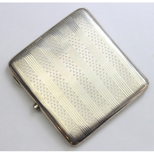 1004 - An antique silver cigarette case with engine turned engraving, Birmingham 1919 by William Base, appr... 