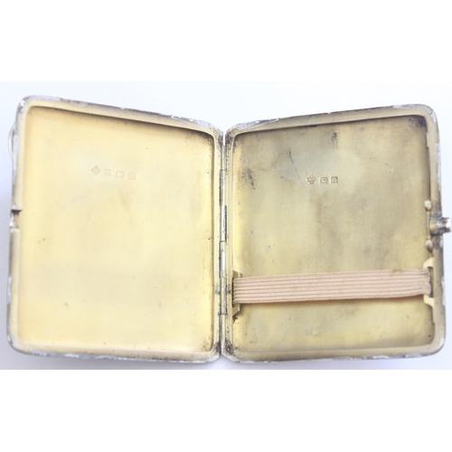 1004 - An antique silver cigarette case with engine turned engraving, Birmingham 1919 by William Base, appr... 