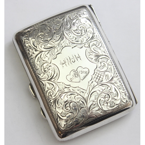 1005 - An antique silver cigarette case with acanthus engraving, Birmingham 1918 by Joseph Gloster limited,... 