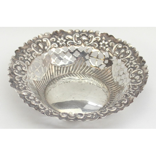 1015 - An antique embossed silver dish and 2 Art Deco period silver ashtrays, various dates and makers, app... 