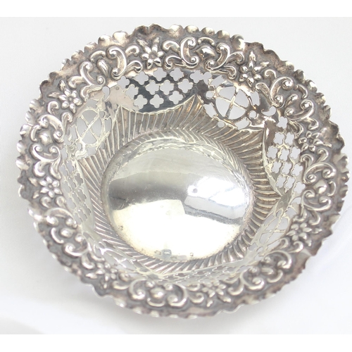 1015 - An antique embossed silver dish and 2 Art Deco period silver ashtrays, various dates and makers, app... 