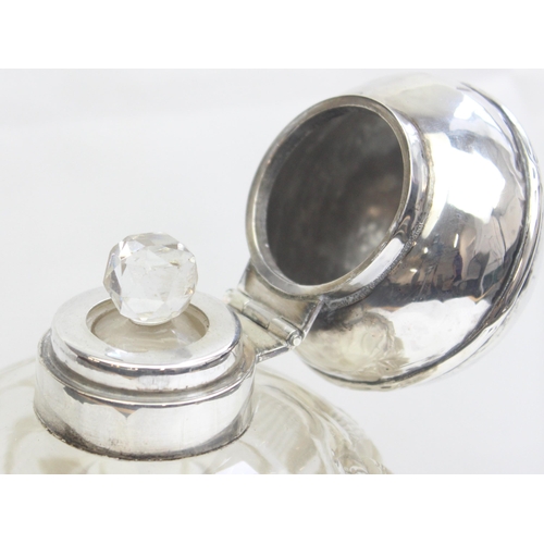 1017 - An Edwardian silver topped and cut glass grenade shaped perfume or scent bottle, Birmingham 1907 by ... 