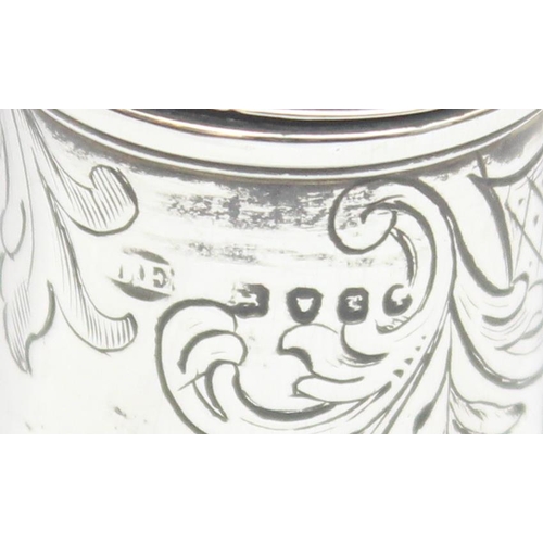 1022 - A Victorian silver pepper pot with engraved decoration, marked for London 1846, makers marks obscure... 