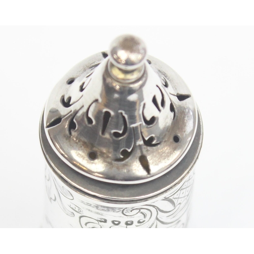 1022 - A Victorian silver pepper pot with engraved decoration, marked for London 1846, makers marks obscure... 