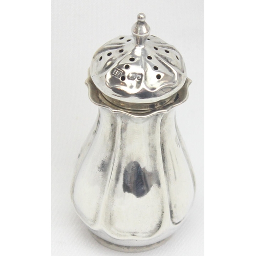 1023 - An Edwardian Art Nouveau silver pepper pot, Sheffield 1910 by Atkin Brothers, and a pair of Georgian... 