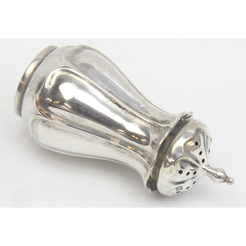 1023 - An Edwardian Art Nouveau silver pepper pot, Sheffield 1910 by Atkin Brothers, and a pair of Georgian... 