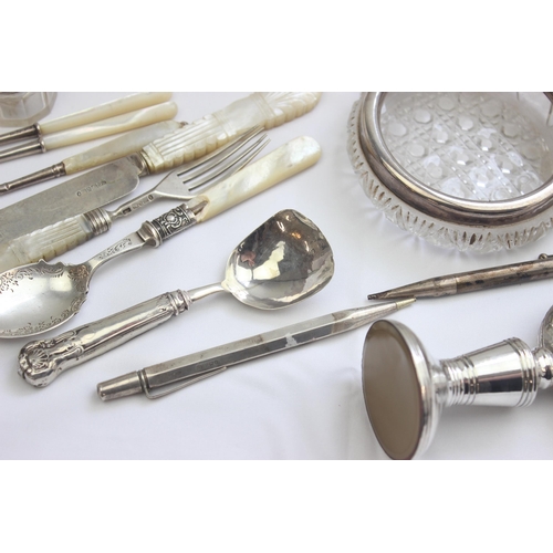 1033 - Qty of assorted silver mounted items to inc cut glass bottles, desk clock, picture frame, pencils, c... 