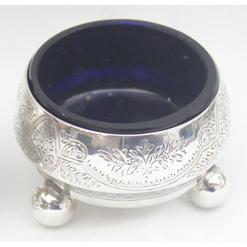 1076 - A set of 3 Victorian silver salts with blue glass liners, the bodies with engraved decoration and 3 ... 