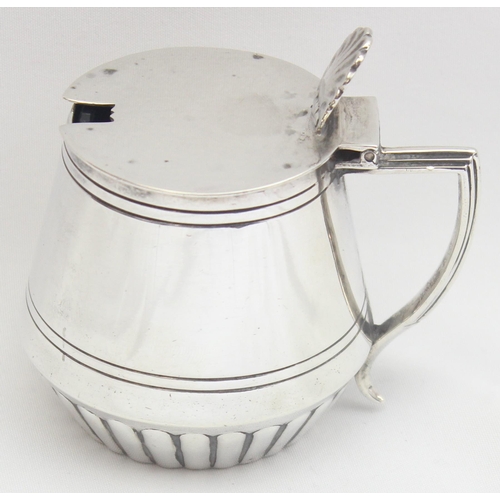 1077 - An Edwardian silver mustard pot of drum form, Sheffield 1909 by Mappin Brothers, approx 89.68g gross... 