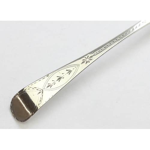 1082 - A Georgian silver serving spoon with bright cut decoration, marks slightly rubbed but believed to be... 