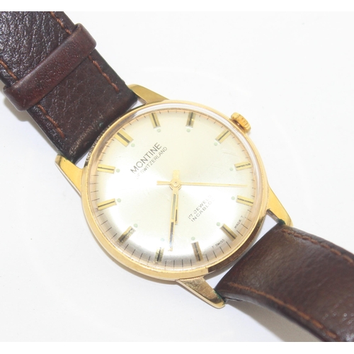 1303 - A vintage Montine of Switzerland gents watch with gold plated case and leather strap