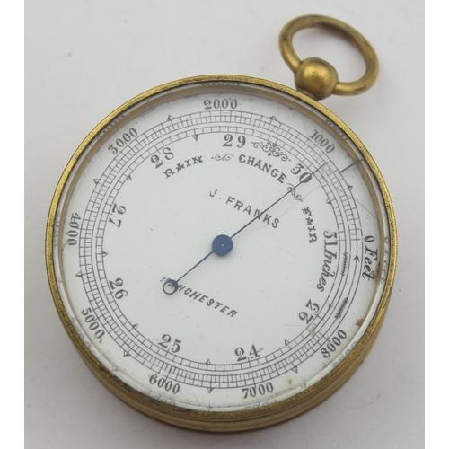 1304 - An antique gilt metal cased pocket barometer by J. Franks of Manchester, with leather case, approx 4... 