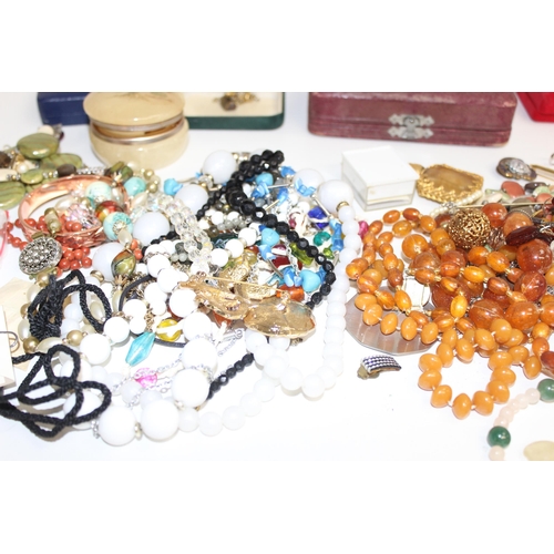 1143 - A large qty of assorted antique and later costume jewellery, some silver items, some boxed etc