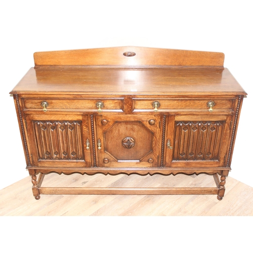 16 - An early 20th century oak sideboard with carved details, approx 151cm wide x 48cm deep x 110cm tall