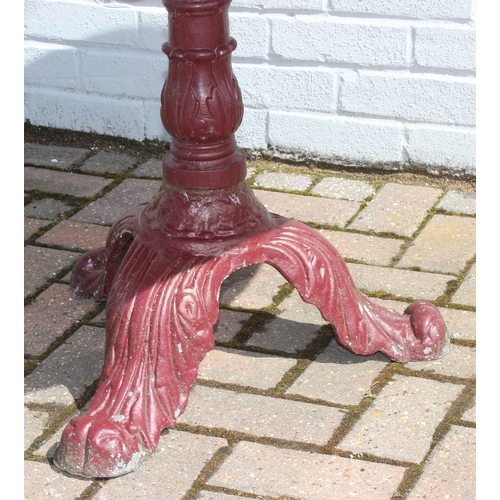 388 - A Victorian style cast aluminium garden table and chairs, burgundy painted finish, the table with ro... 