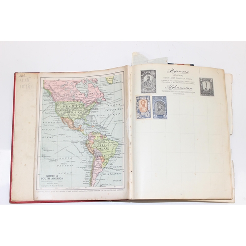 581 - A late 19th or early 20th century world stamp album and contents, Queen Victoria - George VI