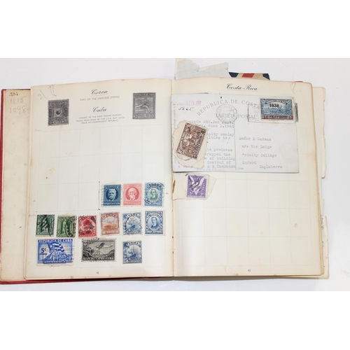 581 - A late 19th or early 20th century world stamp album and contents, Queen Victoria - George VI