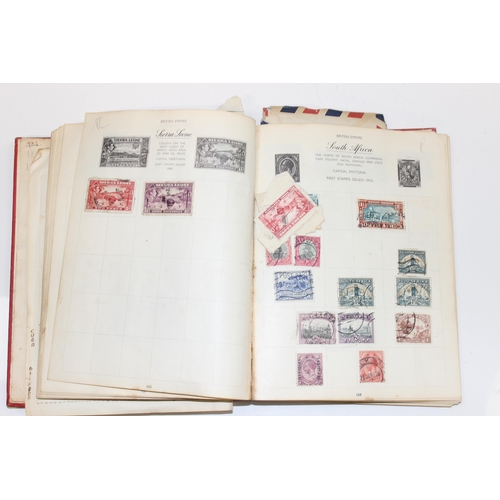 581 - A late 19th or early 20th century world stamp album and contents, Queen Victoria - George VI