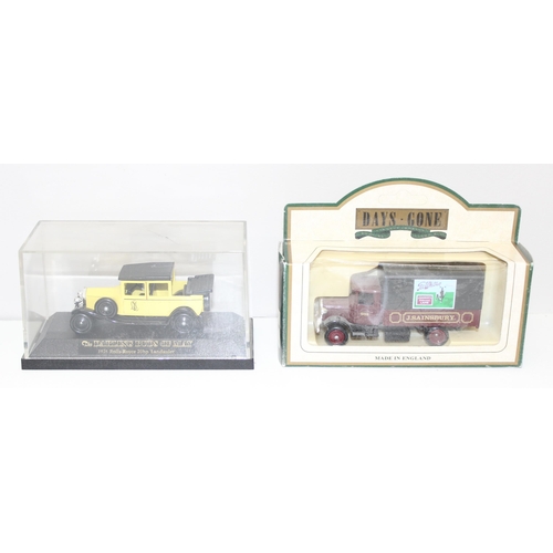 618 - Qty of vintage toy cars to include some boxed and some in display case, various models to include Ll... 