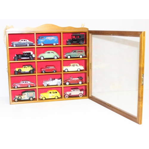 618 - Qty of vintage toy cars to include some boxed and some in display case, various models to include Ll... 