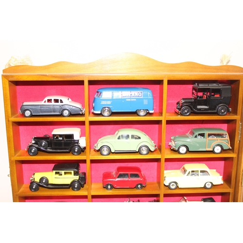 618 - Qty of vintage toy cars to include some boxed and some in display case, various models to include Ll... 