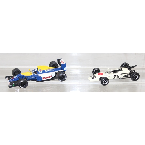 619 - Qty of vintage toy F1 racing cars to include models of 1999 McLaren Mercedes MP4 and the Williams Re... 