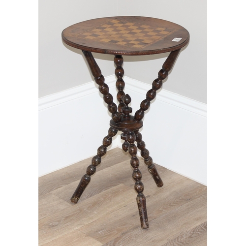 90 - A 19th century tripod chess table or fortune tellers table with inlaid chess board top and bobbin tu... 