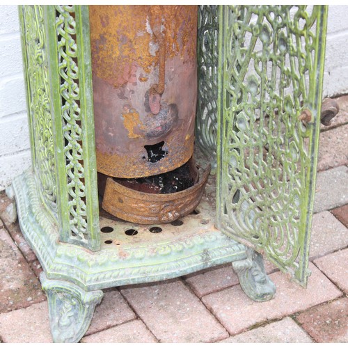 390 - An Art Nouveau period green enamel cast iron wood burning stove by Nestor Martin of Belgium, approx ... 