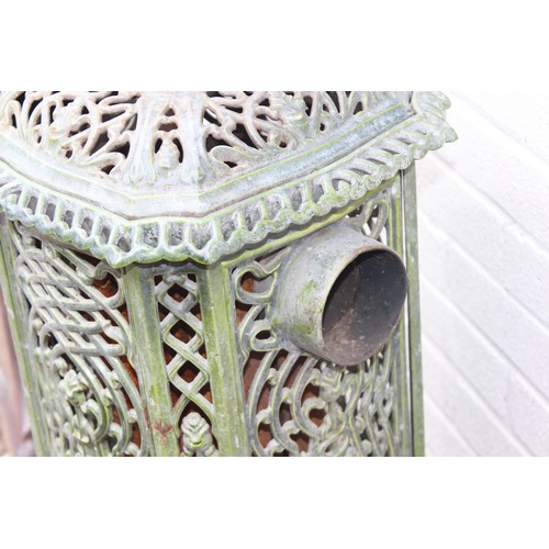 390 - An Art Nouveau period green enamel cast iron wood burning stove by Nestor Martin of Belgium, approx ... 