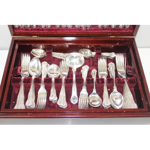 1060 - Cooper Ludlam of Sheffield silver-plated canteen of Kings Pattern cutlery in polished wooden box