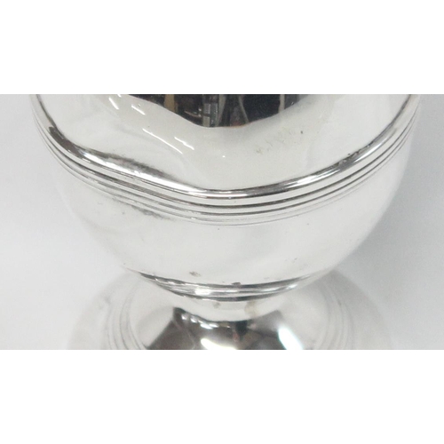 1064 - An antique silver pepper pot of Georgian form, Chester 1913 by George Nathan & Ridley Hayes, approx ... 