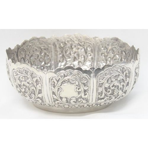 1070 - A highly decorative Anglo-Indian or Burmese silver bowl with embossed decoration, unmarked but XRF t... 