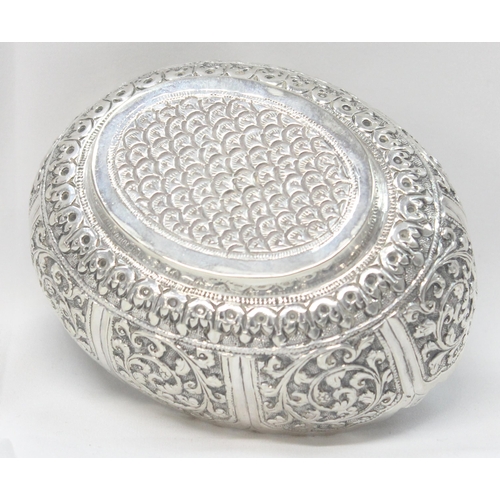 1070 - A highly decorative Anglo-Indian or Burmese silver bowl with embossed decoration, unmarked but XRF t... 